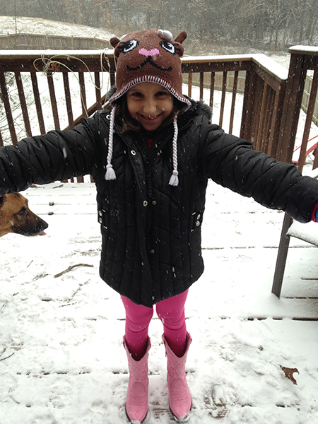 Antonia had to wear a hat and cowboy boots to protect her from the elements.